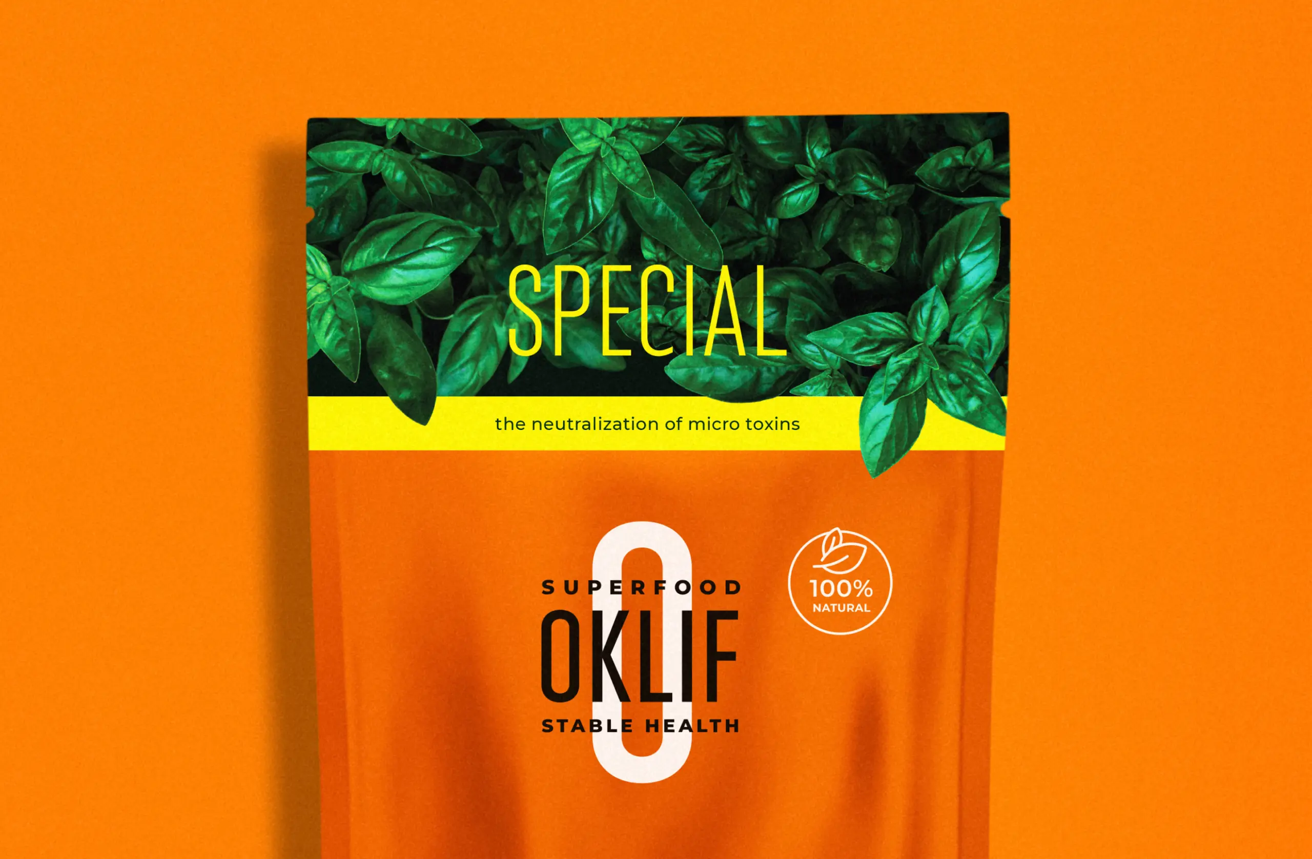 Oklif Special superfood pouch with green leaves on an orange background