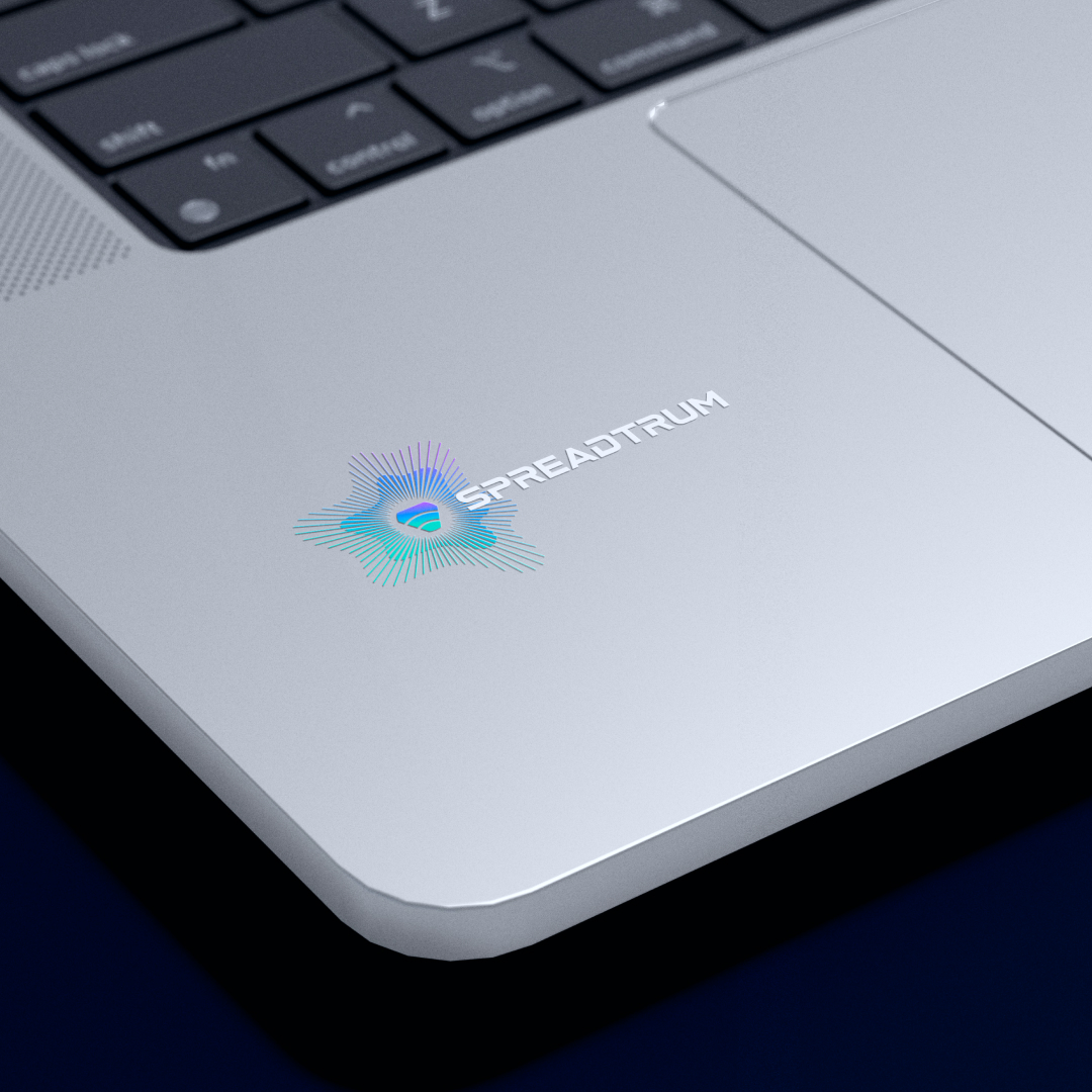 Spreadtrum logo with an iridescent emblem on a silver laptop