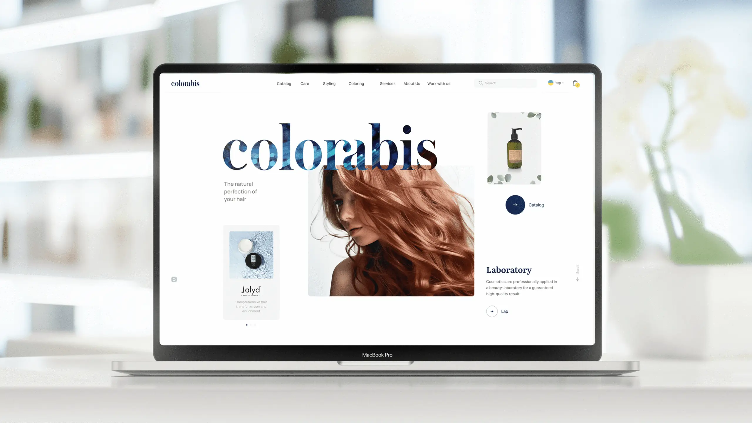 Colorabis hair-care online store home page on a laptop